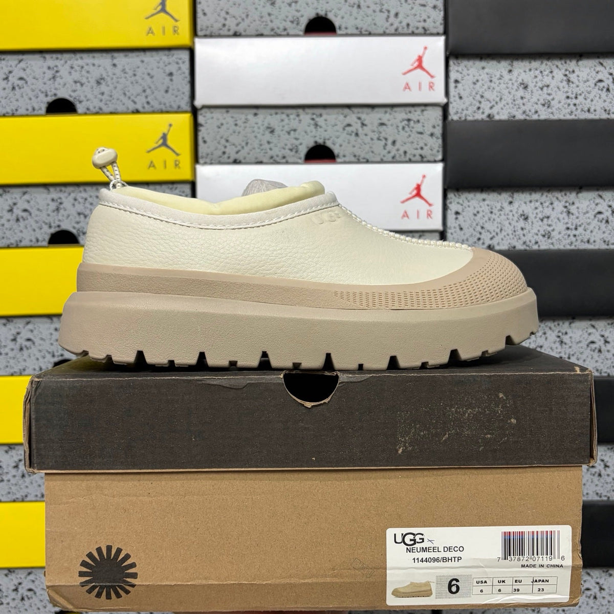 UGG Neumeel Deco Slip-On – Leather Moccasin Sneaker with Cream Lug Sole & Rope Drawstring in Cream