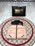 The North Face Puffer Vest in Blush Pink and Black with Stand Collar